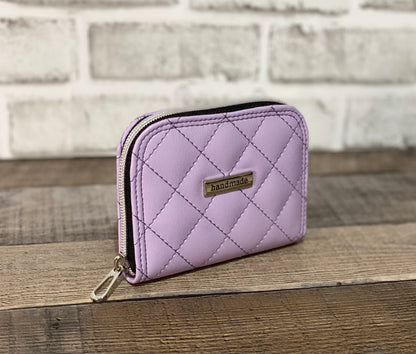 Quilted lilac zip around wallet. Front and side view