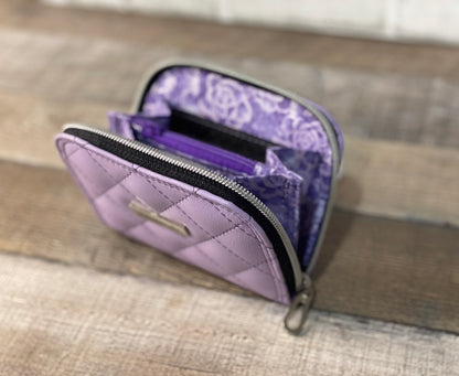 Quilted lilac zip around wallet. lining view