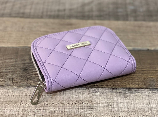 Quilted lilac zip around wallet. Front view