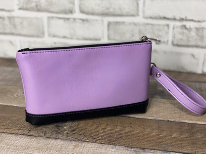 Lilac wristlet with embroidered butterfly back panel