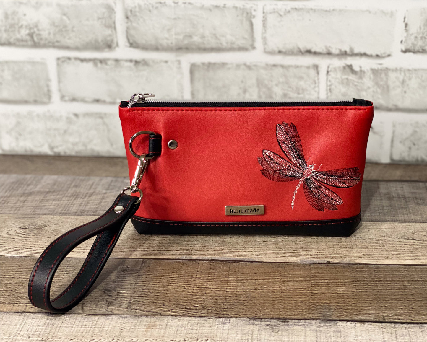 Red dragonfly wristlet front