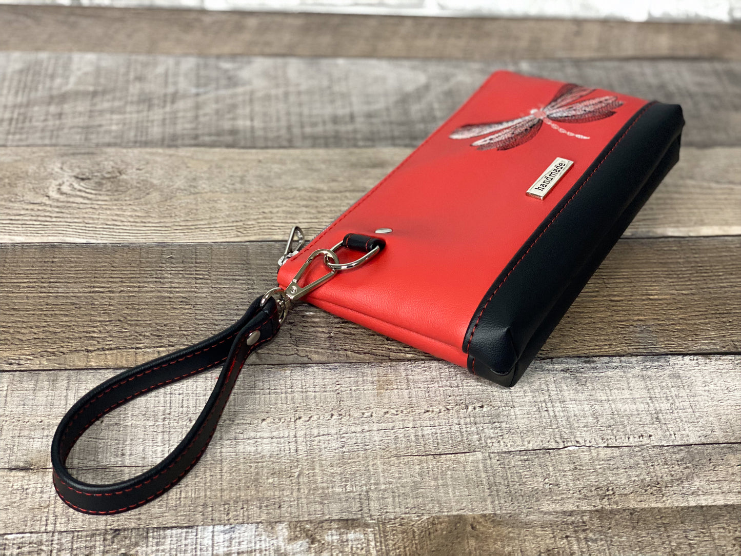 Red dragonfly wristlet bottom and side view