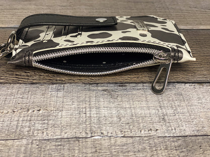 Black and white cow print purse pal wristlet wallet interior view. 