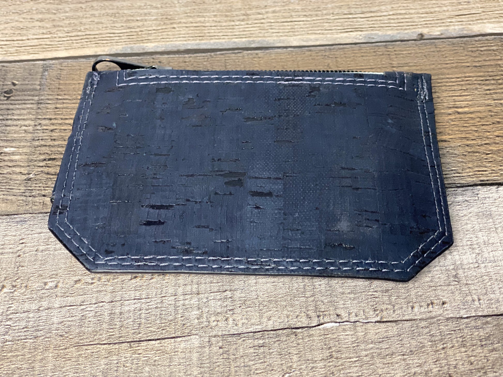 Blue cork fabric pocket pal wallet back panel view. 