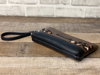 Brown wristlet with leopard print accents.